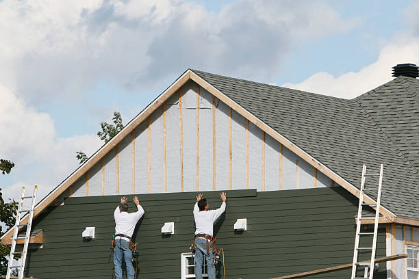 Professional Storm Damage Siding Repair technician working in Coalport, PA